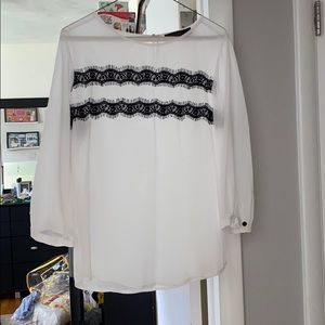 White abs black blouse
